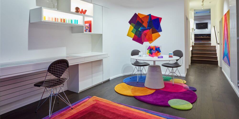 Sonya Winner colourful geometric After Matisse and Bubbles rugs shown in the contemporary Sonya Winner design destination showroom in North London