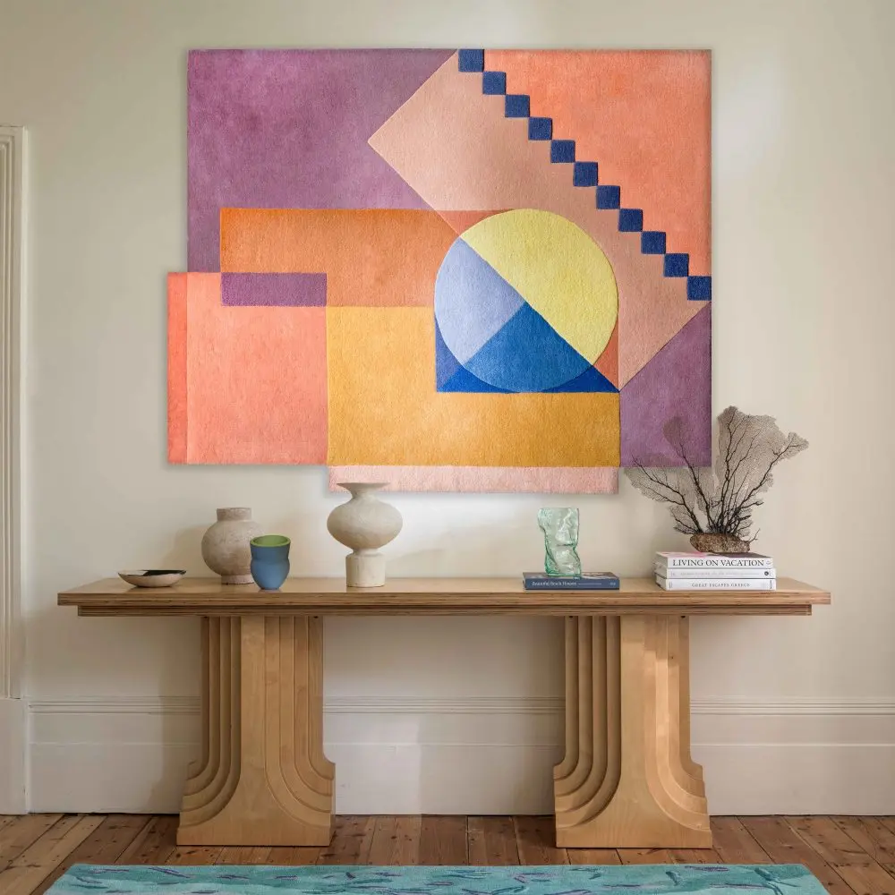 The Santorini Sunrise Rug by Sonya Winner as a wall hanging 