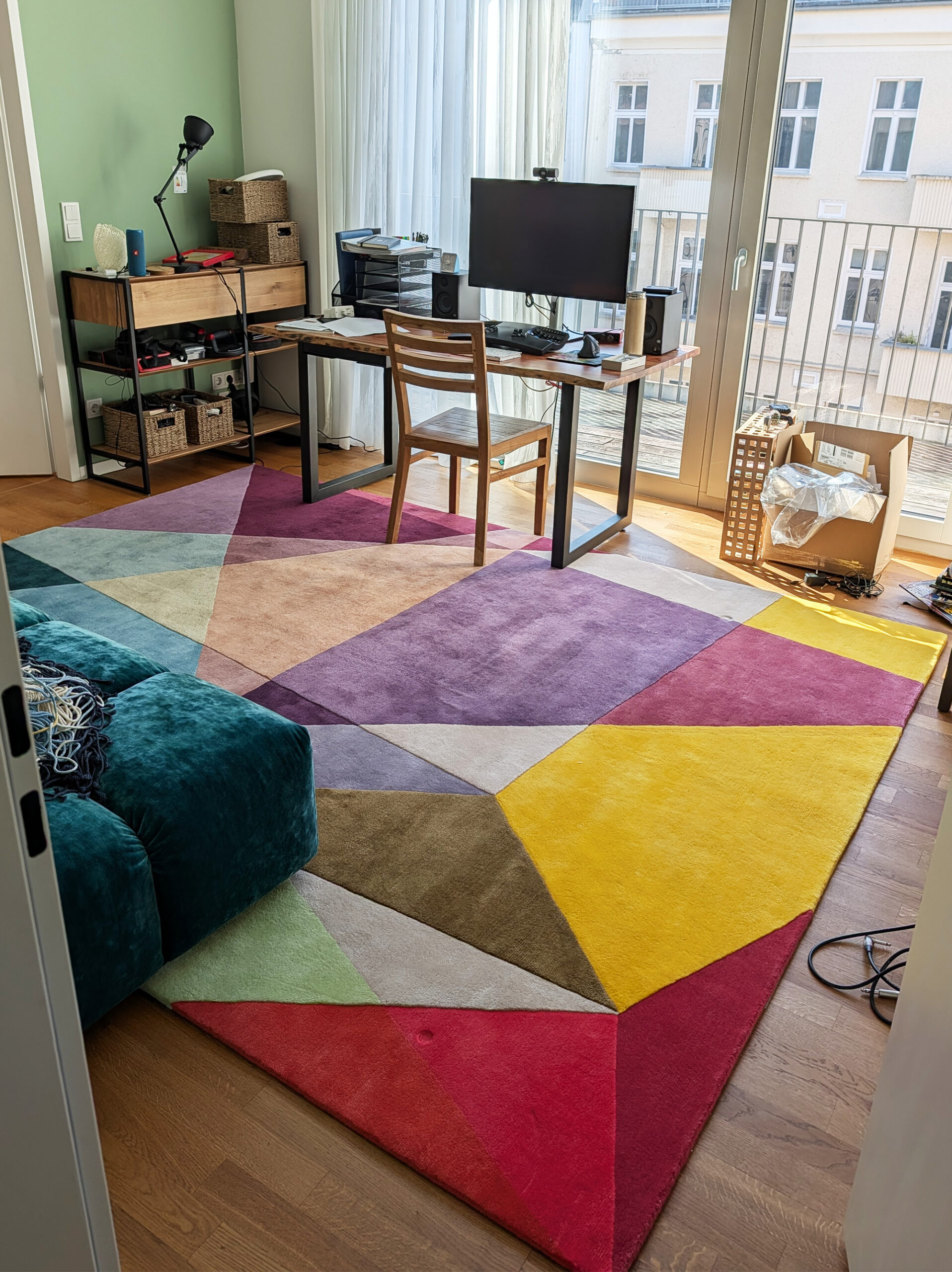 Photos of Prism Vibrant Rectangle Rug in customer office
