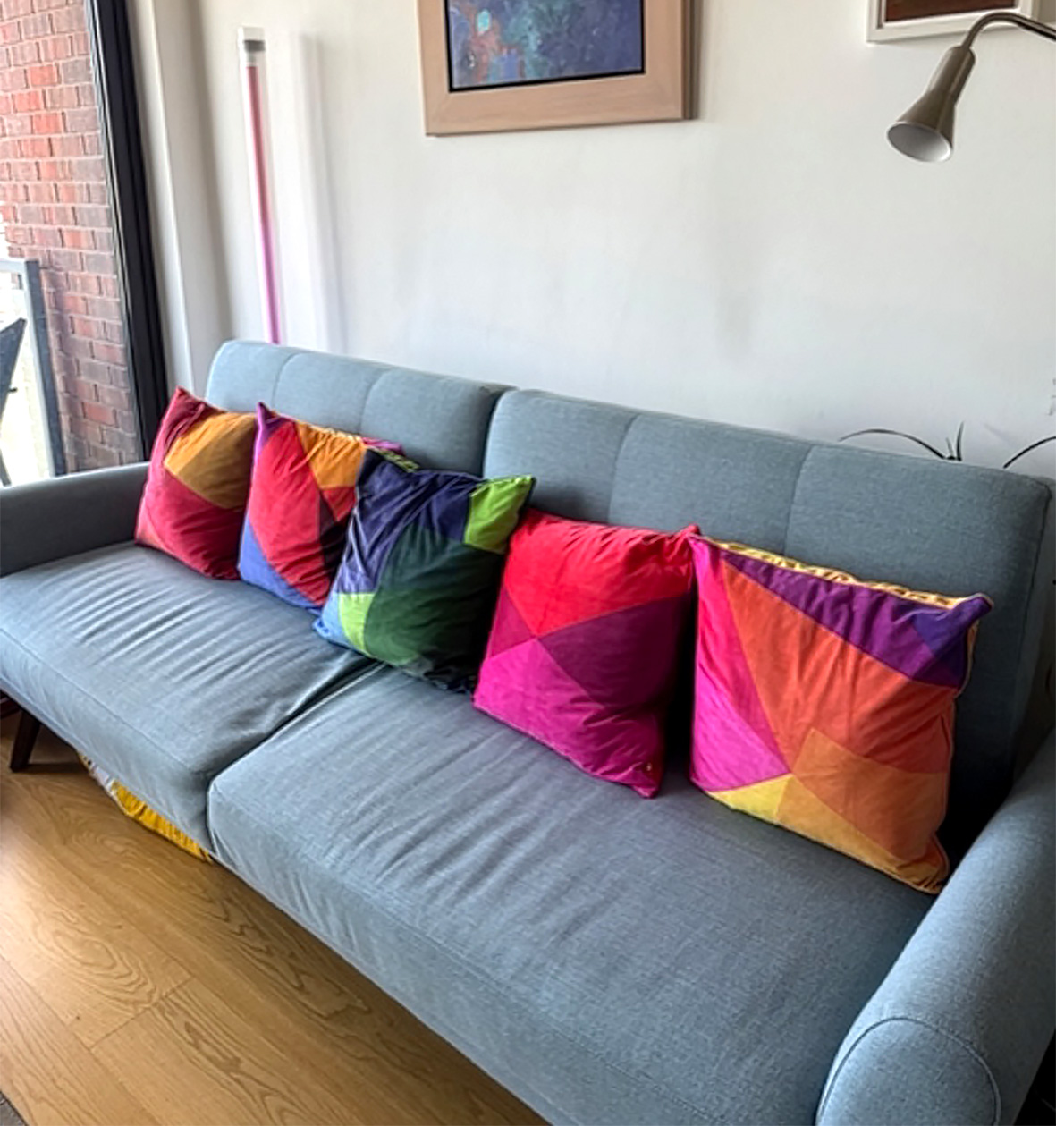Set of 5 After Matisse cushion covers on client sofa