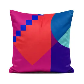 Geometric designer pink, red and blue Santorini Sunset cushion on white background