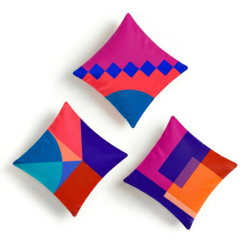 Set of 3 cushions Geometric designer pink, red and blue Santorini Sunset cushion on white background