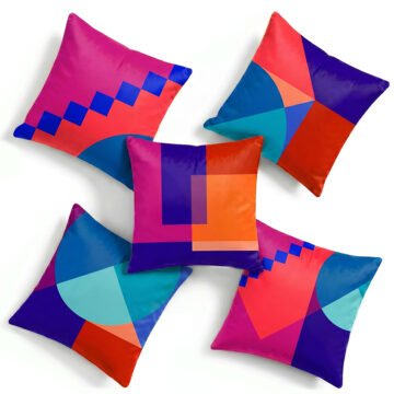 Set of 5 cushions Geometric designer pink, red and blue Santorini Sunset cushion on white background